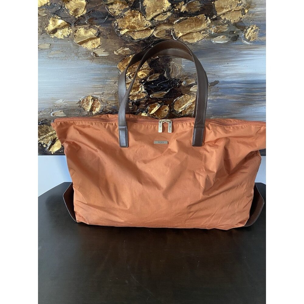 Tumi Foldable Packable Leather Bottom Orange Duff… - image 1